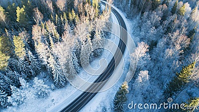 Winding winter road as seen from above. Winter season. Transportation concept Stock Photo