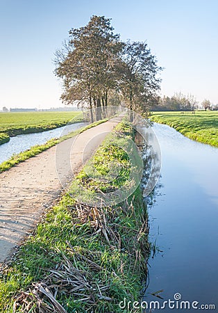 A windless autumn day at a narrow river Stock Photo