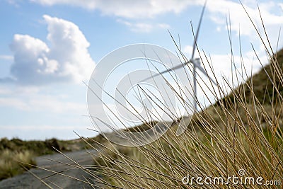 Windmill on the beach Stock Photo