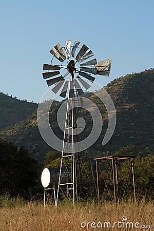 Windmill, blue sky and winter landscape in the Dome Area, Nortwest. Stock Photo