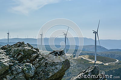 Windmill electric generator tower in Portugal Stock Photo