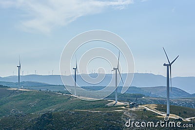 Windmill electric generator tower in Portugal Stock Photo