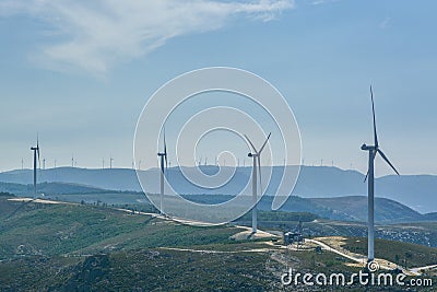 Windmill electric generator tower in Portugal Stock Photo