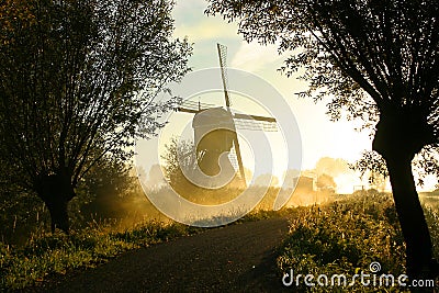 Windmill in fog Stock Photo