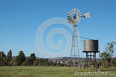 Windmill in paddock Stock Photo
