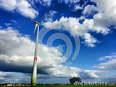 Windmill for renewable electric energy production Stock Photo