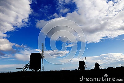 Windmill silhouettes Stock Photo