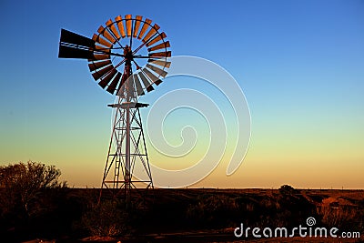 Windmill Sunset in Central Australia Stock Photo