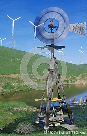 Windmill and wind turbines on Route 580 in Livermore, CA Editorial Stock Photo