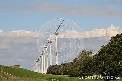 Windmills behind the dike on the Urk peninsula Editorial Stock Photo