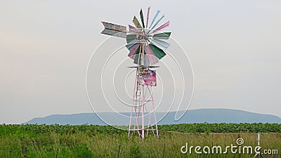 Colourful windmill near Fochville, North West, South Africa. Stock Photo