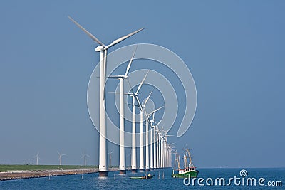 Windmills and fishery ship Stock Photo