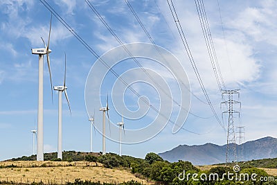 Windmills and powerlines Los Llanos windfarm MÃ¡laga Spain Editorial Stock Photo