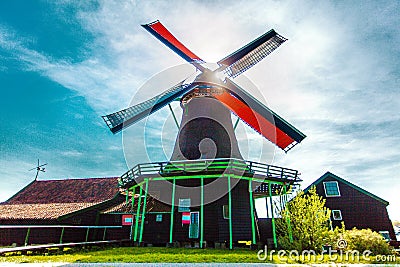 Windmills. Summer at Zaanse Schans. Authentic dutch landscape with old wind mills. Holland, Netherlands Stock Photo