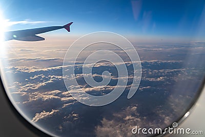 The window of the airplane. A view of porthole window on board an airbus for your travel concept Stock Photo