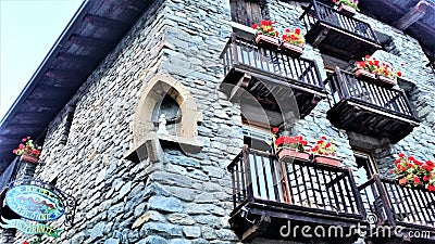 Window Boxes in Medieval Stone Building in Dolonne Editorial Stock Photo