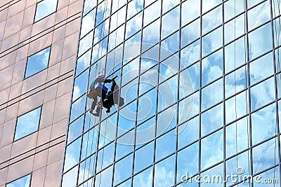 Window cleaner at work Stock Photo