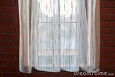 Window curtains in loft apartments Stock Photo