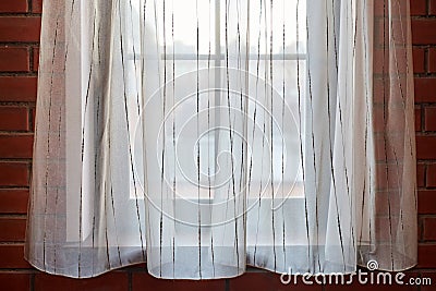 Window curtains in loft apartments Stock Photo