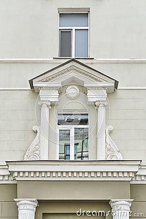 A window in a residential building decorated in the neoclassical style Stock Photo