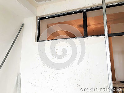 Window, frame for glass. Material for repairs in an apartment is under construction remodeling rebuilding and renovation. Stock Photo