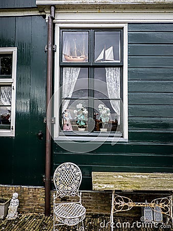 A window at a wooden house at Zaansche Schans, Holland Stock Photo