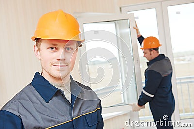 Window installation workers Stock Photo