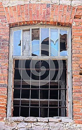 Window lattice to brick wall Stock Photo