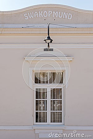 Window and lettering on the facade of the former Otavi railway station Swakopmund, Namibia Editorial Stock Photo