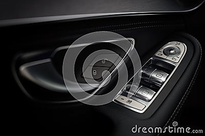 Window open close control button in car. Stock Photo