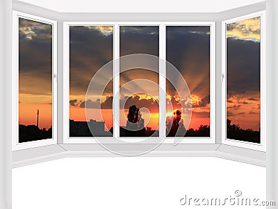 Window overlooking the scarlet sunset Stock Photo