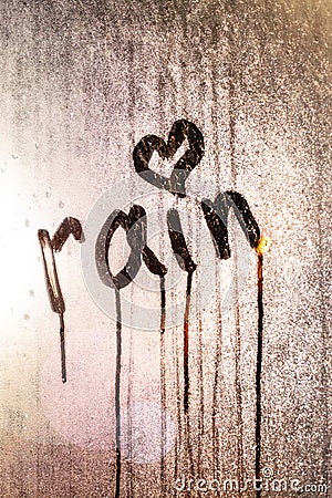 Window with raindrops. Stock photo inscription on wet glass Stock Photo