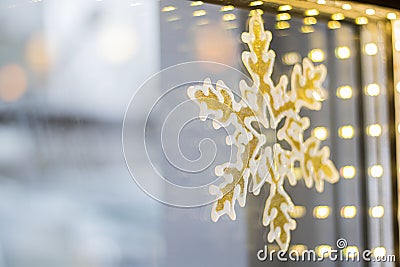 Window with snowflake and bokeh lights line. Horizontal with copy space. Hotel and restaurant booking on holidays, party Stock Photo