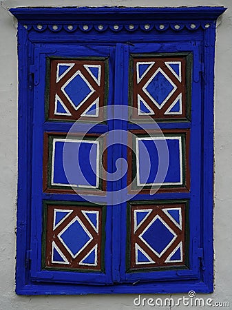 The window with traditional motifs used in the traditional Romanian houses from the Danube Delta area Stock Photo