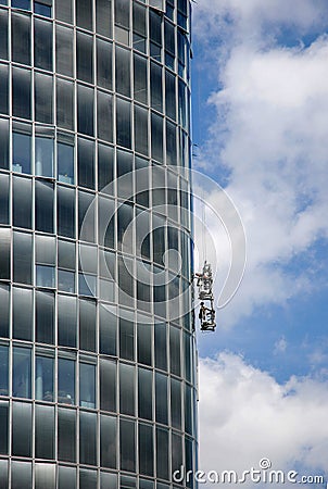 Window washers at work at a skyscraper Editorial Stock Photo