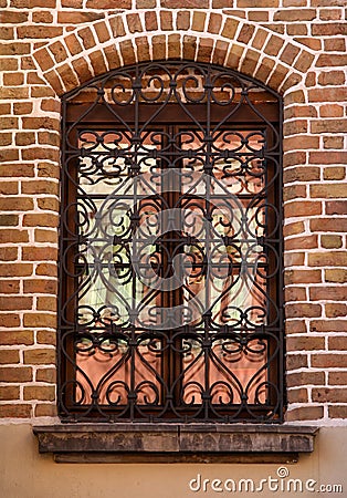 Window with well ornamented grill Stock Photo