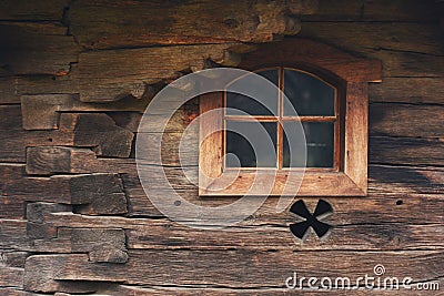 Window on a wooden romanian church Stock Photo