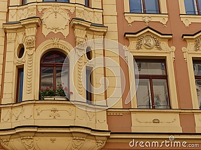 Windows of an ancient decorated building of Prague in Czech Republic. Editorial Stock Photo