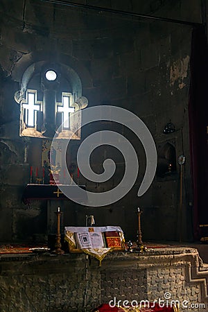 Windows in the form of a cross, view of the altar of the temple in Tatev Monastery Stock Photo