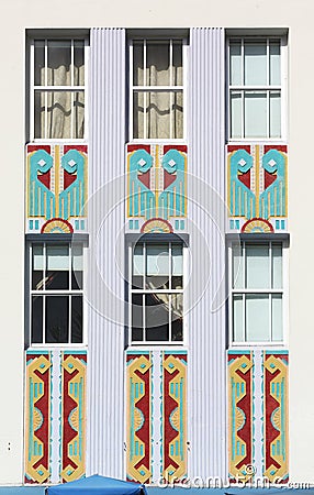 Windows & friezes of Art Deco building Stock Photo