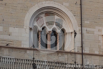 Windows at the Inner yard of medieval palace Palazzo del Broletto, Brescia, Lombardy, Italy Editorial Stock Photo