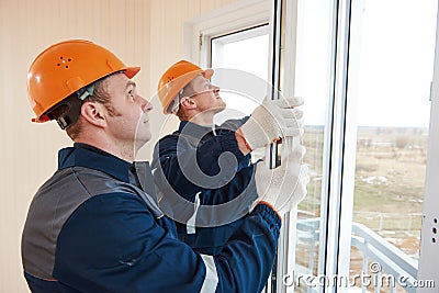 Windows installation workers Stock Photo