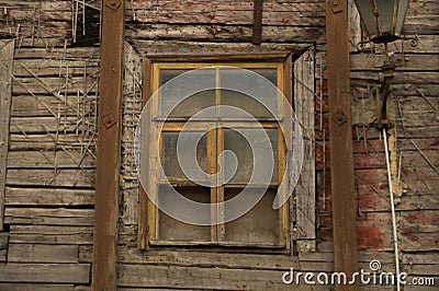 Windows of the old wooden house. wooden wall with windows Stock Photo