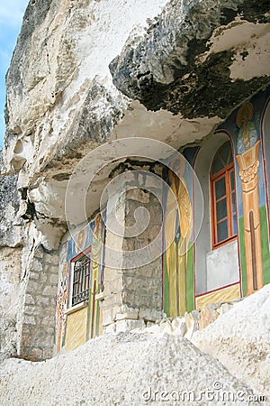 Windows of rock monastery Stock Photo