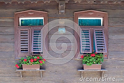 Windows on typical wooden house in the village Krapje, Croatia Editorial Stock Photo