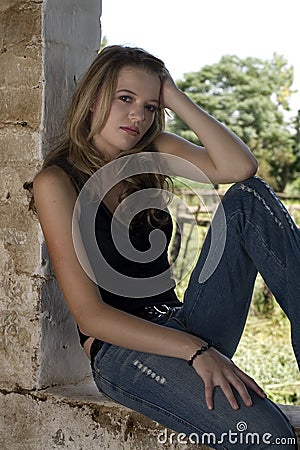 Windowsill teenager Stock Photo