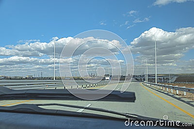 Windscreen view of road, sky Stock Photo