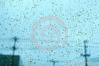Windshield rain drop car window on blue daylight. Stock Photo