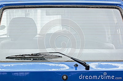 Windshield Wiper Arm and Blade on Sun Bleached Veihicle Stock Photo