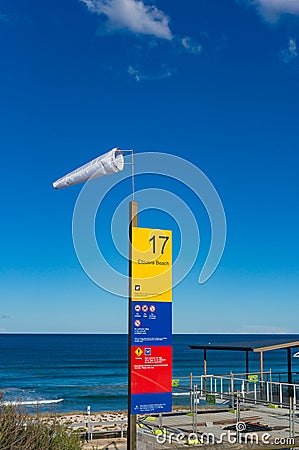 Windsock and information board. High wind on the beach Editorial Stock Photo